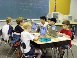 Kids using computers in a computer lab