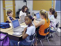 Children using computers in computer lab